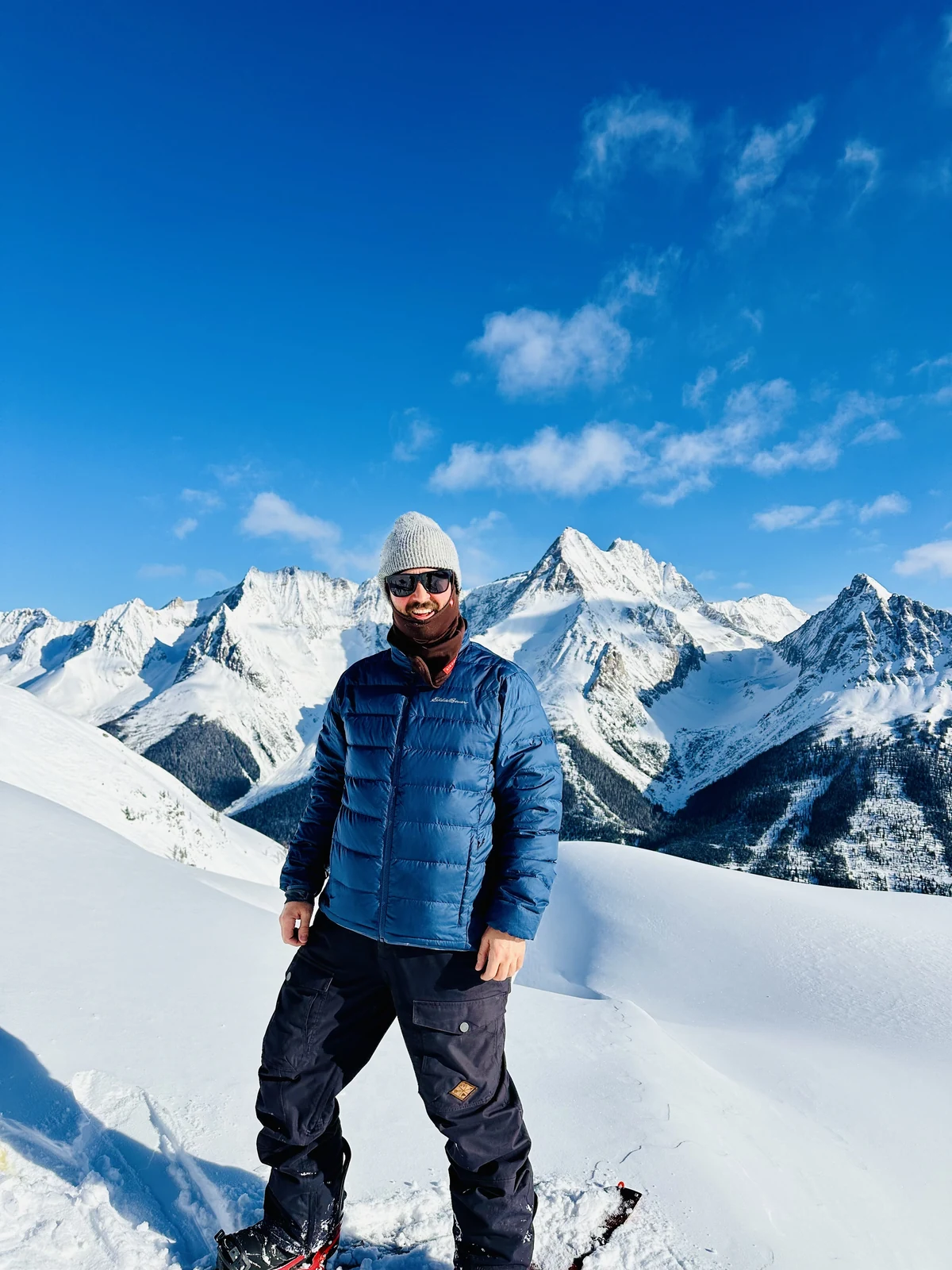 Dave Trerice standing on a snowy summit